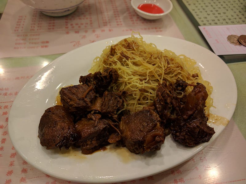 1) Egg tart and pineapple bun at Kam Wah Cafe; 2) Baked Char Siu buns at Tim Ho Wan; 3) 凤爪排骨饭 at Tim Ho Wan; 4) Lo Mien at Mak An Kee