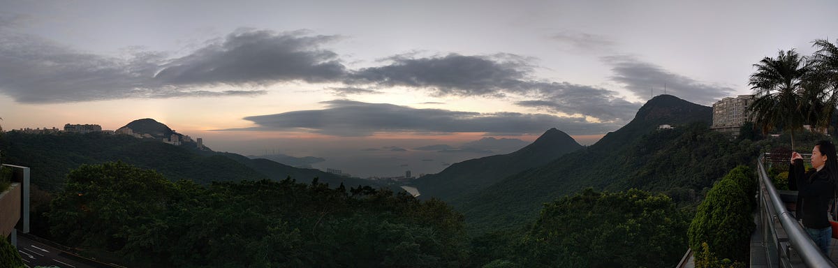 Sunset at The Peak in Hong Kong, with views of the Harbour and outlying islands